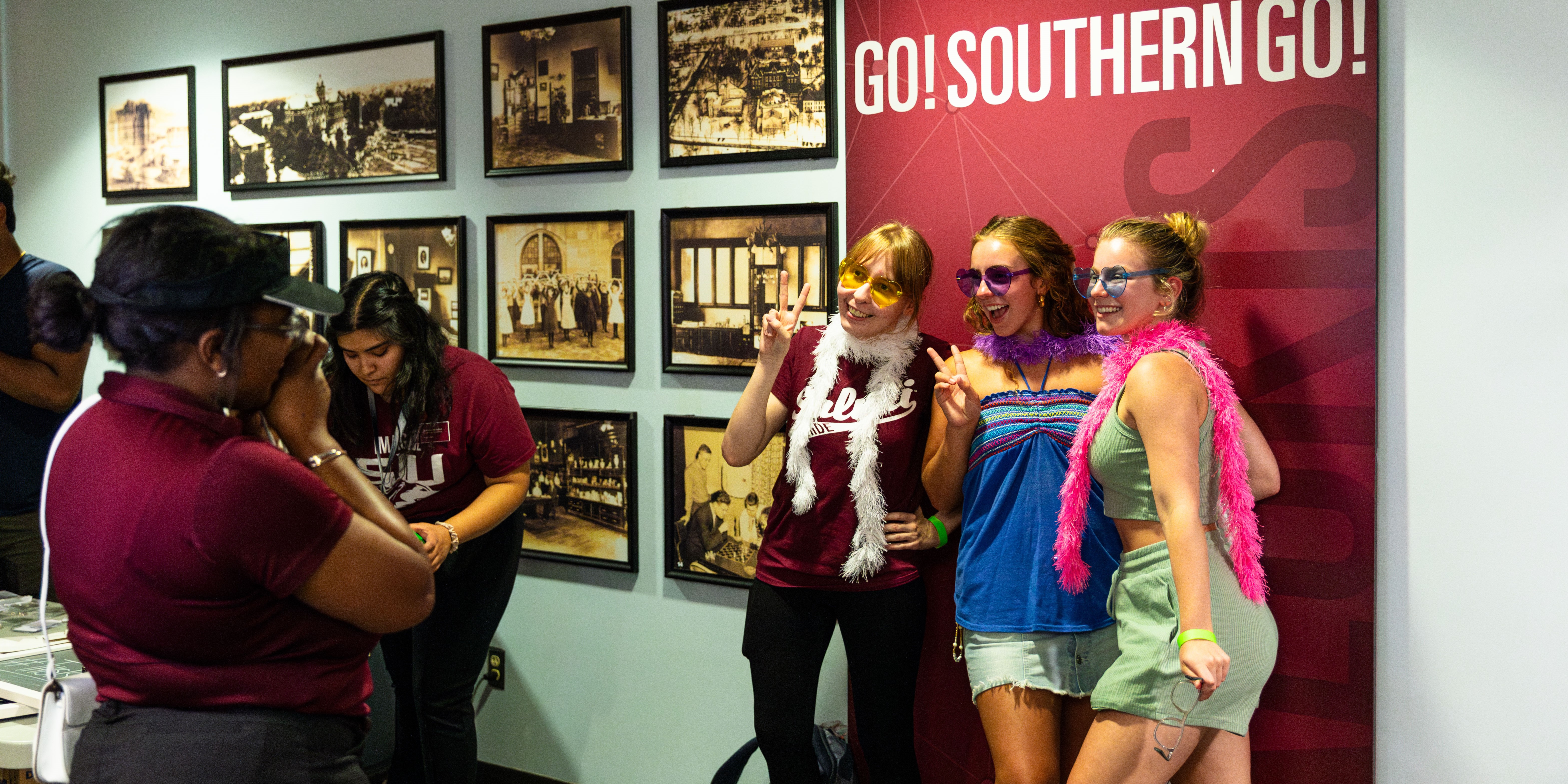 Students posing for a photo at Dawg's Nite Out.