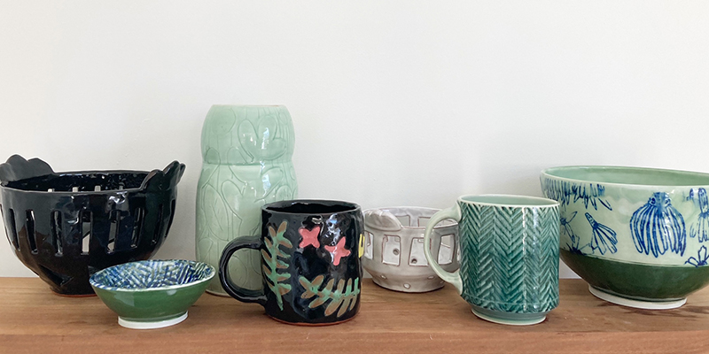 Collection of pottery made by workshop instructors's Kari Woolsey and Stephanie Dukat