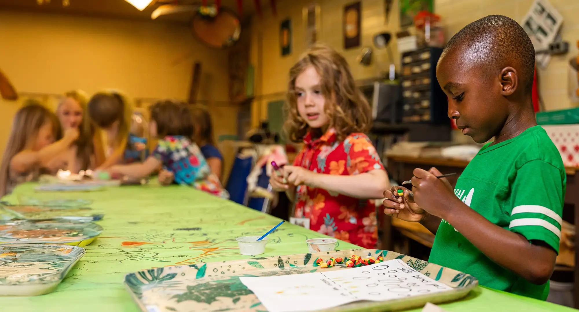 children working on projects at the craft shop