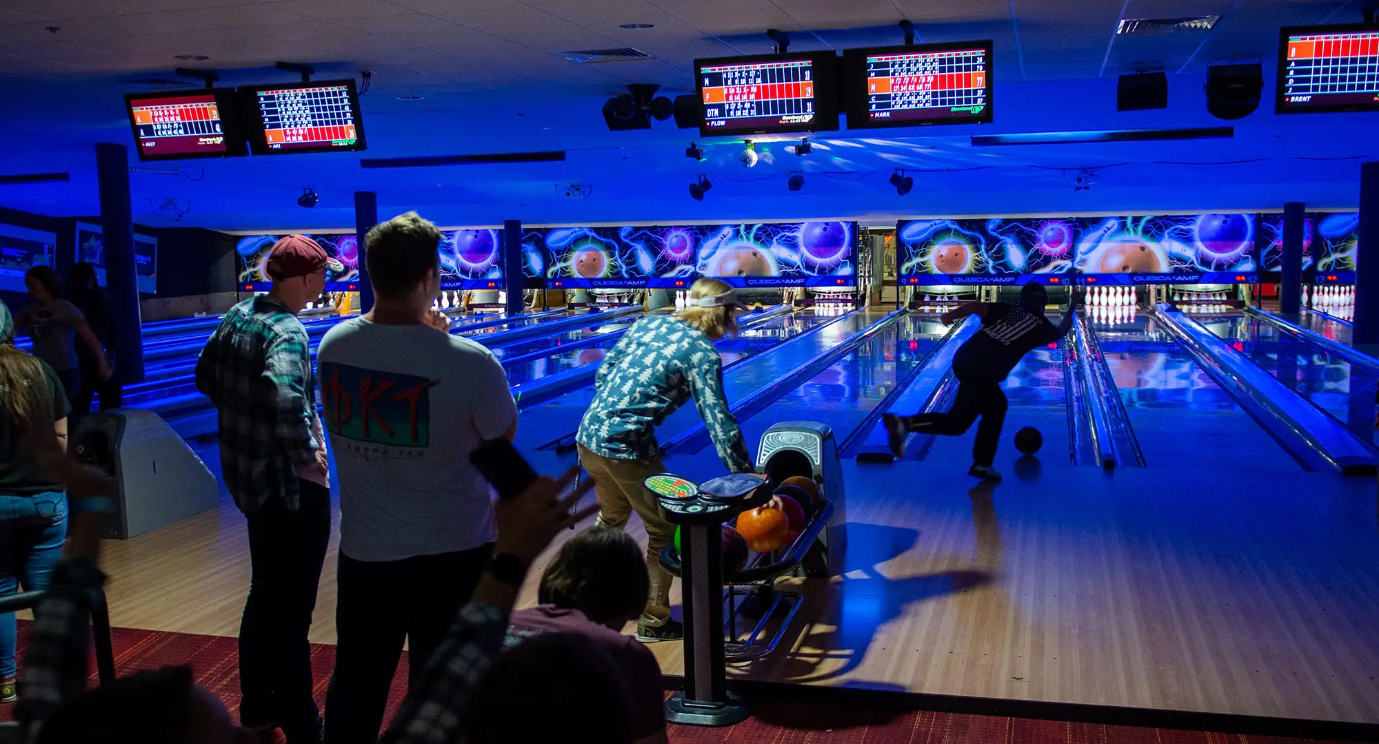people bowling at the student center
