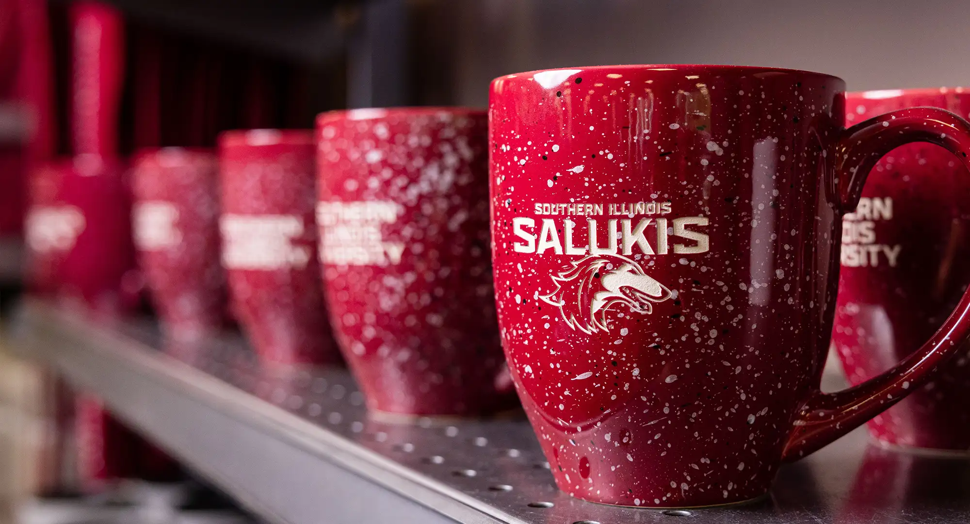 a line of saluki mugs