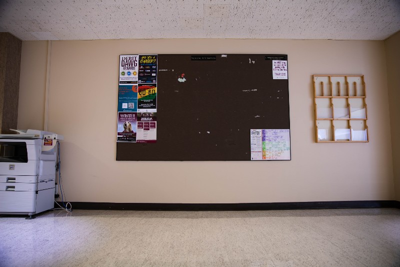 bulletin board with posters